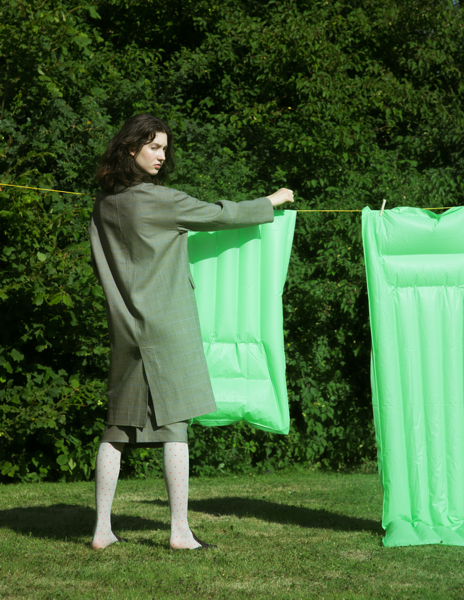 Model with lilos for editorial