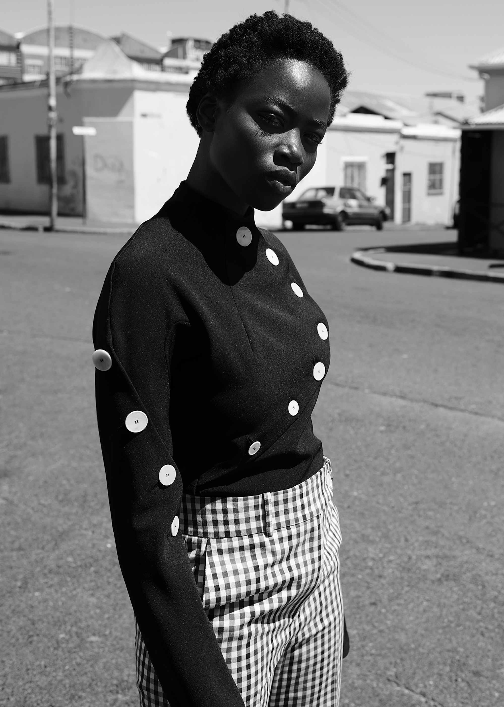 Model Olivia Sang wearing button top