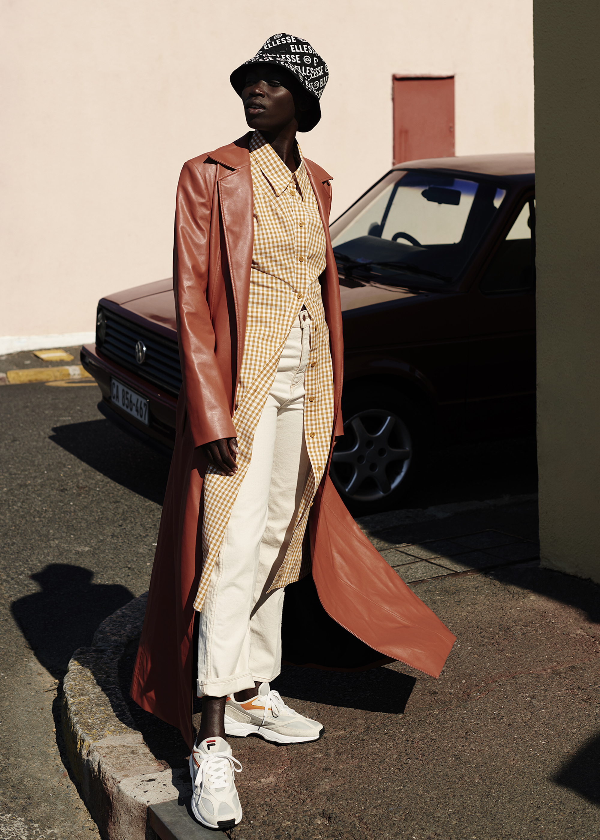 Model Olivia Sang wearing leather trench