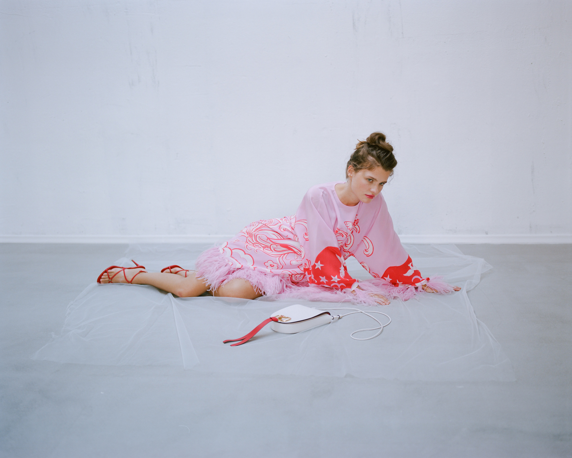 A fine line fashion editorial pink dress