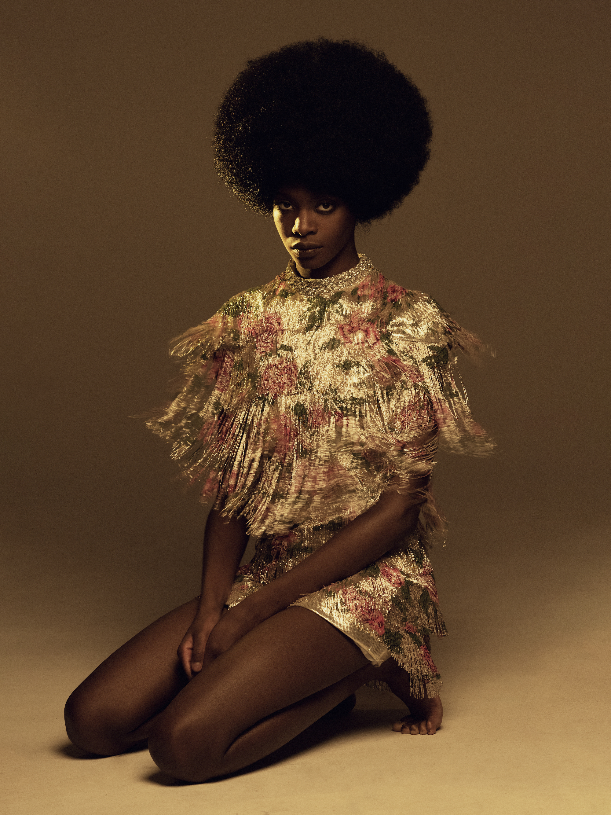 floral ruffle dress golden hue fashion editorial