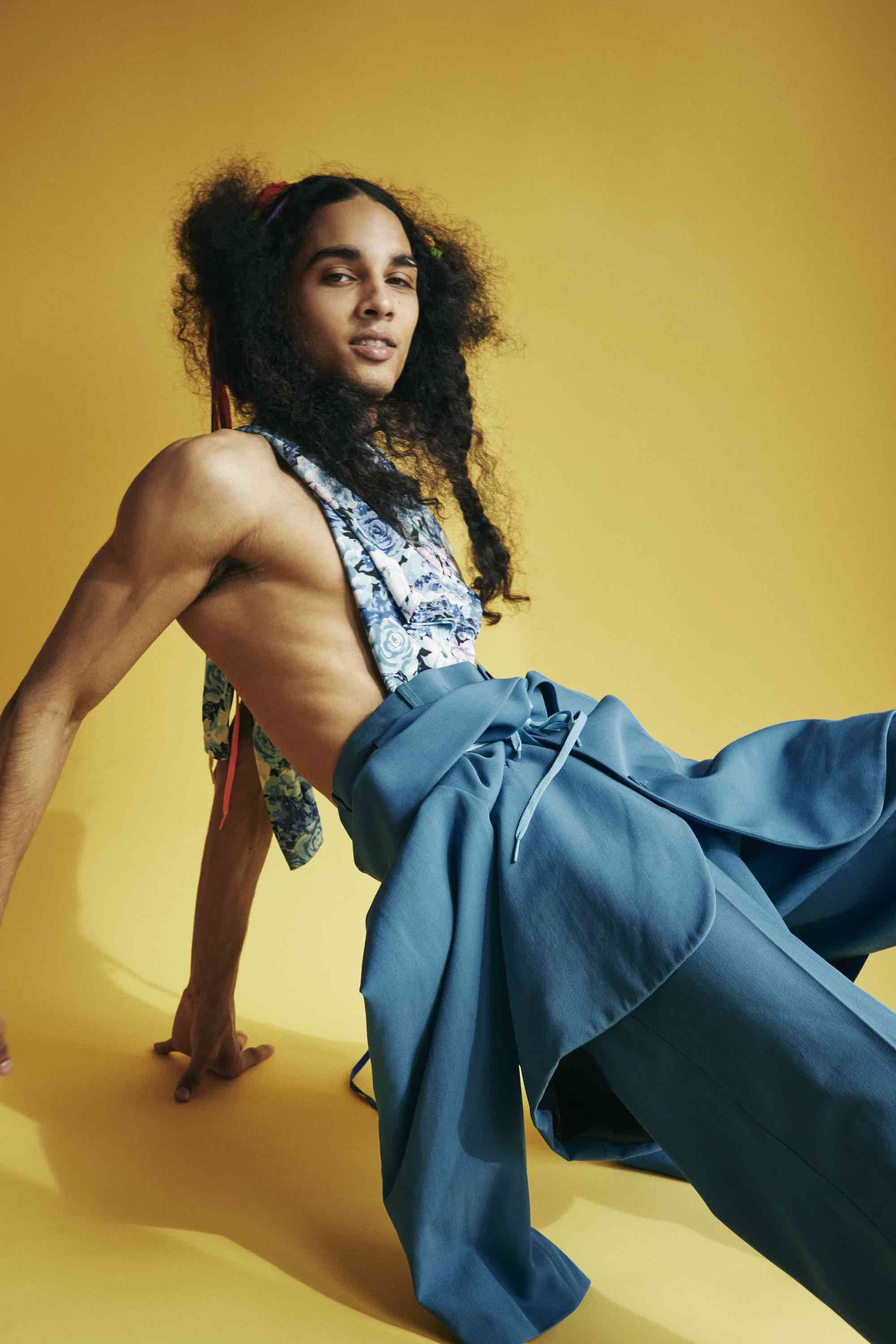 Model in blue trousers