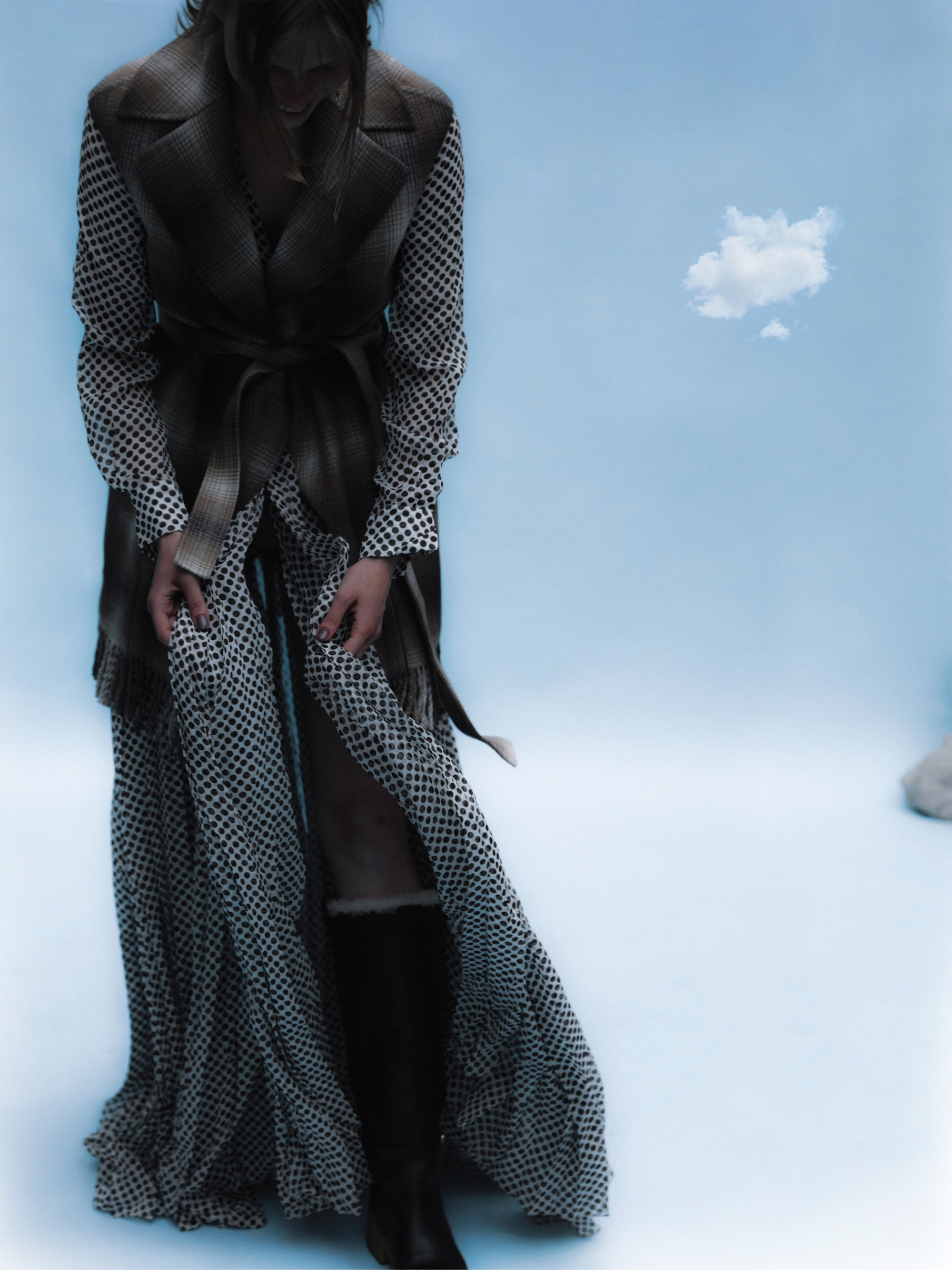 wearing all black blue background