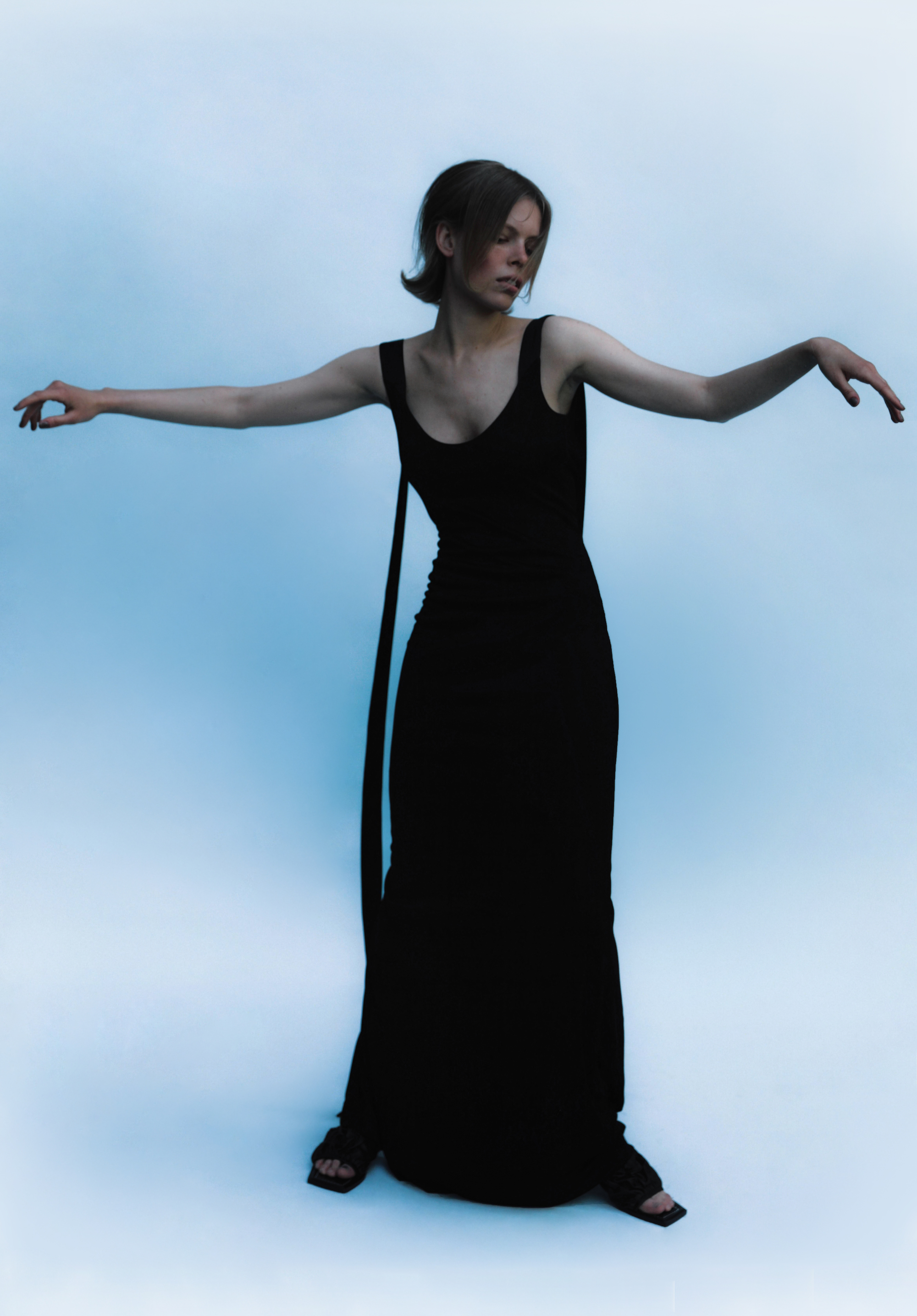 woman wearing Long black dress