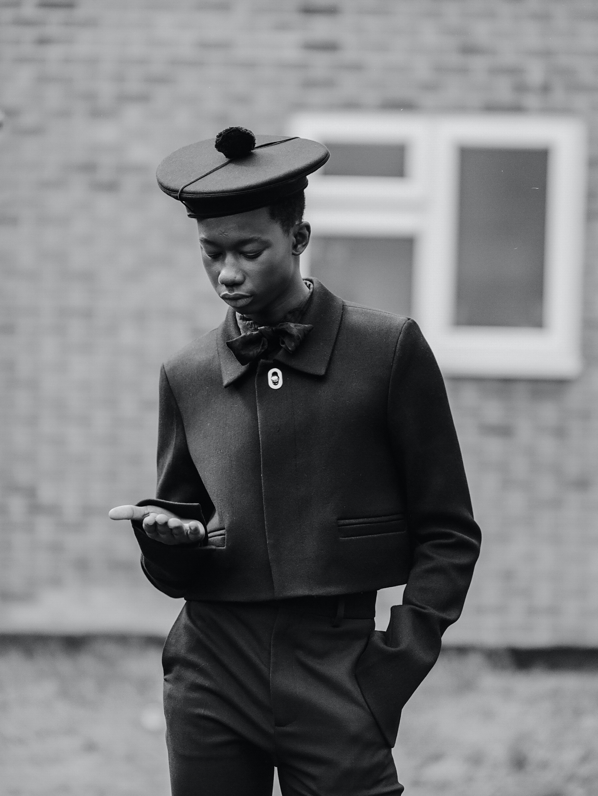 model wearing black jumper black and white shot